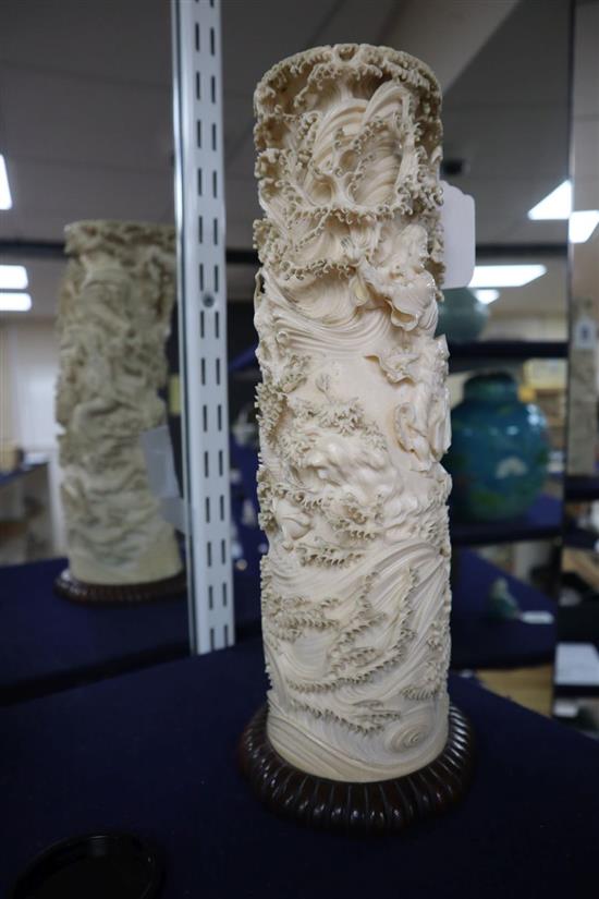 An early 20th century Japanese ivory tusk carving, unsigned, on wood plinth